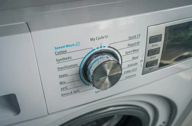 Close-up of a washing machine program dial